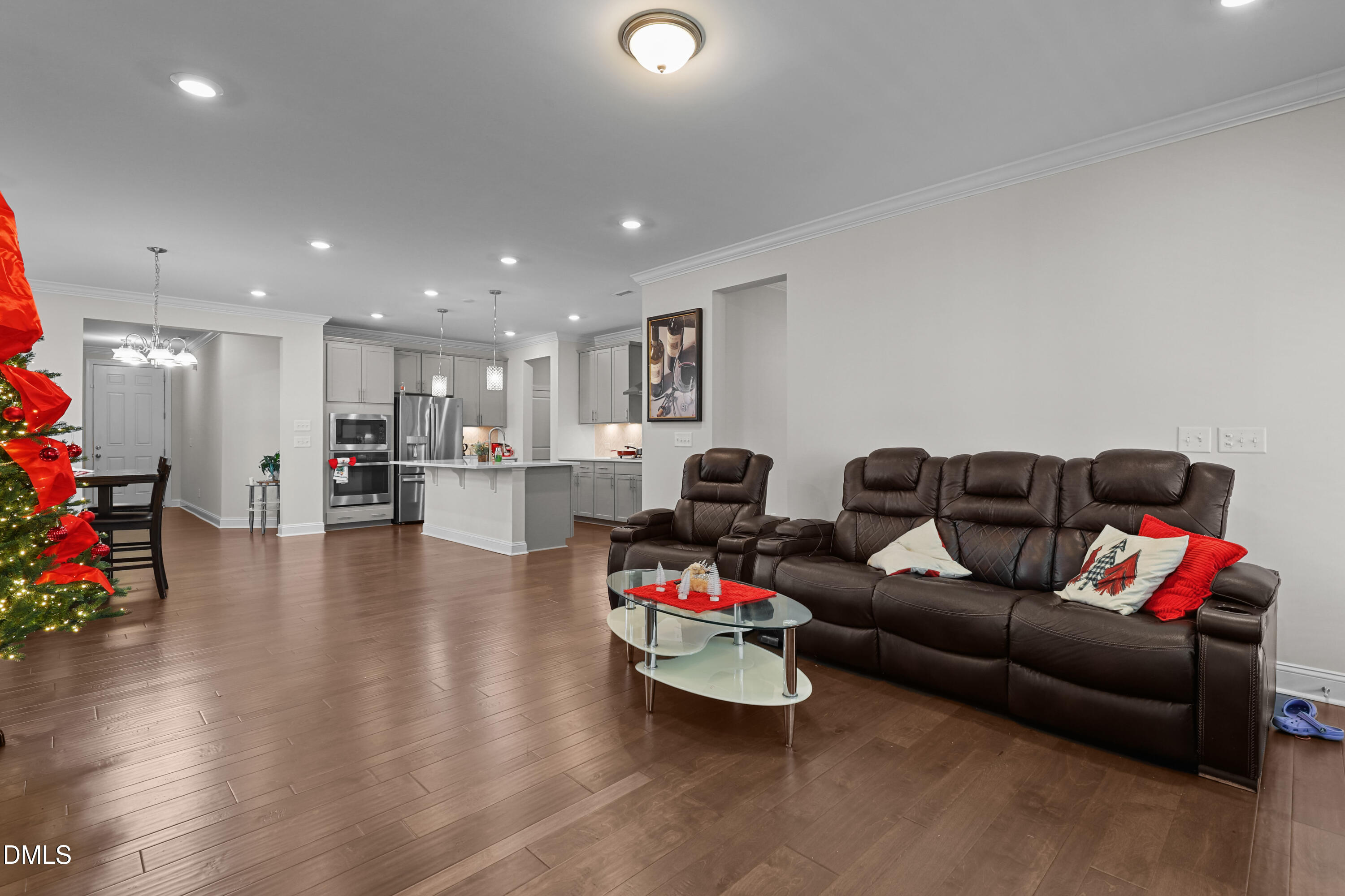 6117 Balance Court Raleigh, NC 27616 - Photo 14 of 44 a living room with furniture and a wooden floor