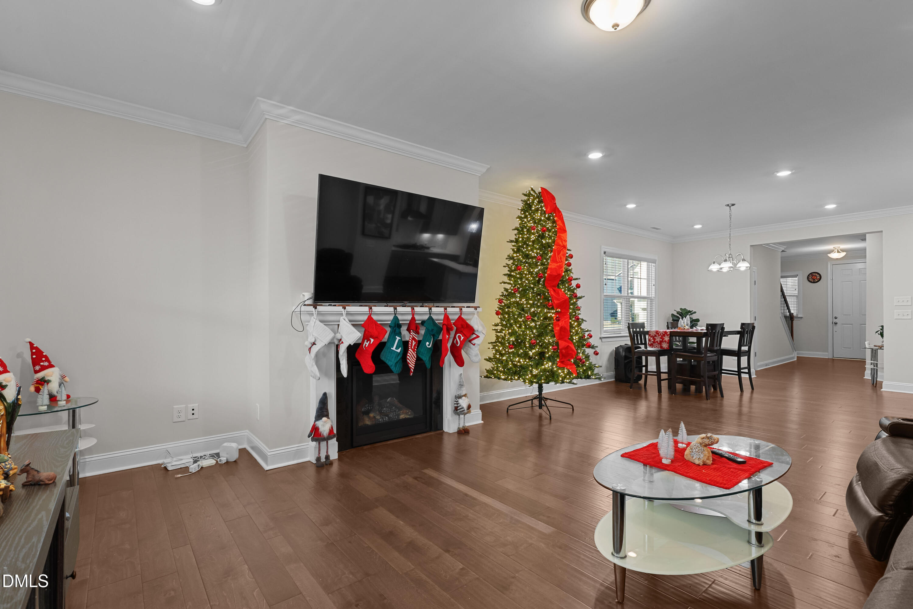6117 Balance Court Raleigh, NC 27616 - Photo 15 of 44 a living room with furniture and a flat screen tv