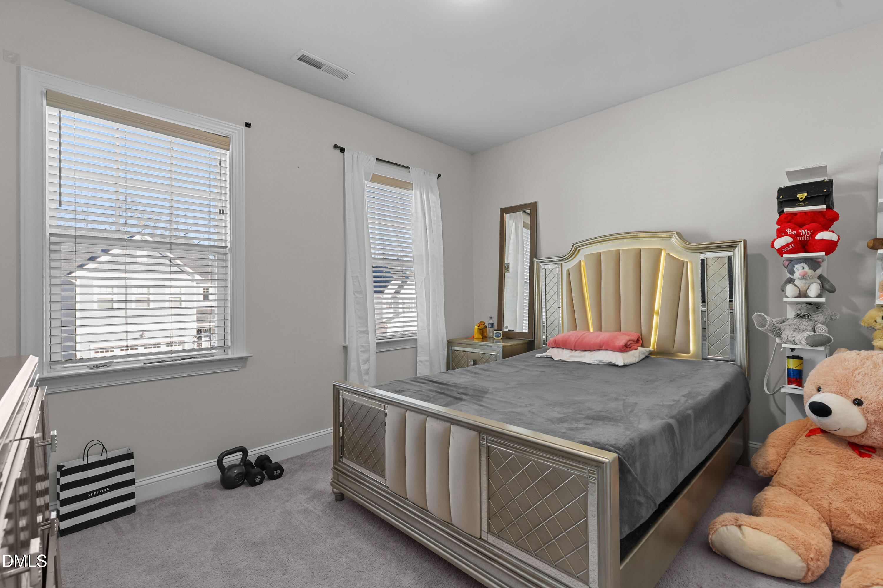 6117 Balance Court Raleigh, NC 27616 - Photo 36 of 44 a view of bedroom and bedroom