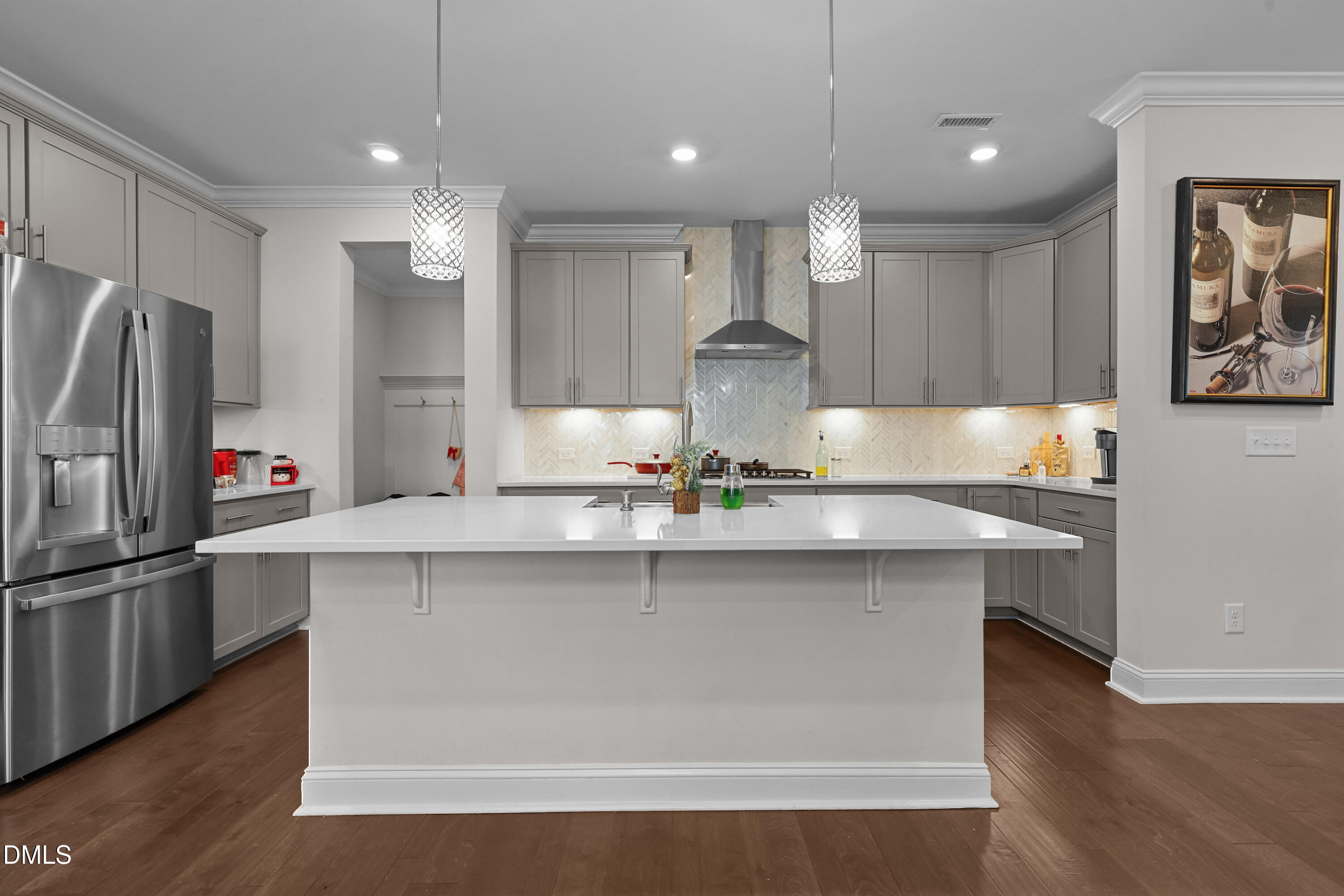 6117 Balance Court Raleigh, NC 27616 - Photo 5 of 44 a kitchen with stainless steel appliances granite countertop a sink a refrigerator and a stove