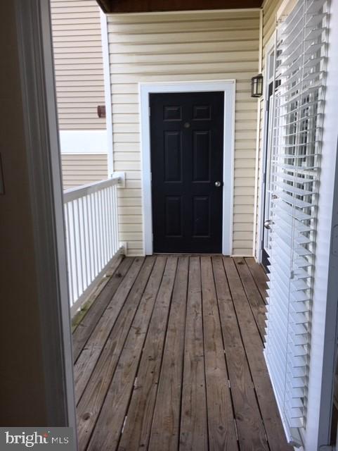 502 Sunset View Terrace Southeast, Unit 302 Leesburg, VA 20175 - Photo 41 of 50 Enter balcony from bedroom OR living room.