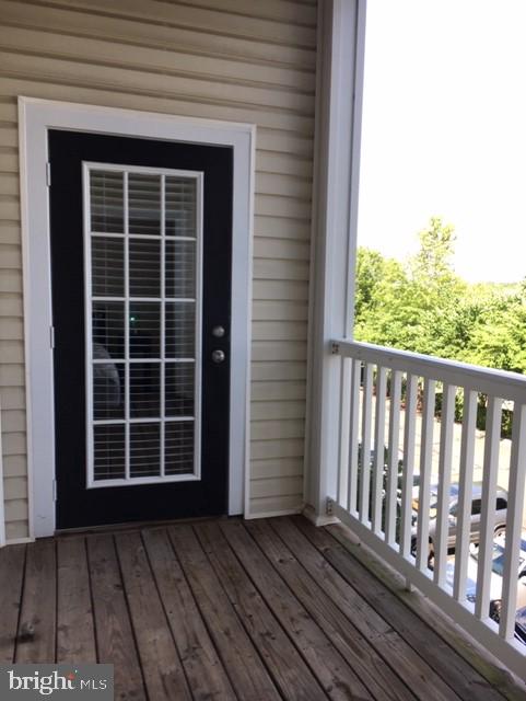 502 Sunset View Terrace Southeast, Unit 302 Leesburg, VA 20175 - Photo 42 of 50 Enter balcony from bedroom OR living room.