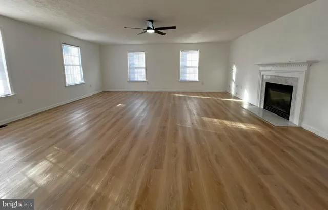 a living room with a fireplace