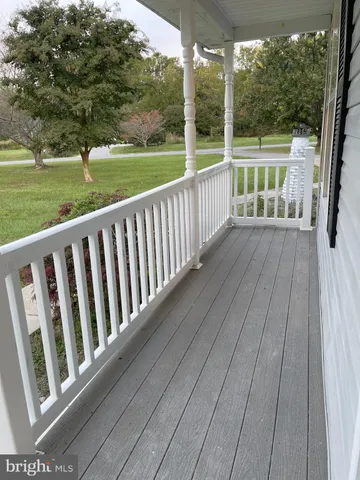 a view of a ocean with a mountain in the background