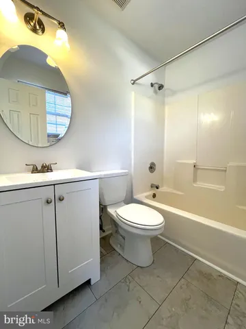 a view of a room with windows