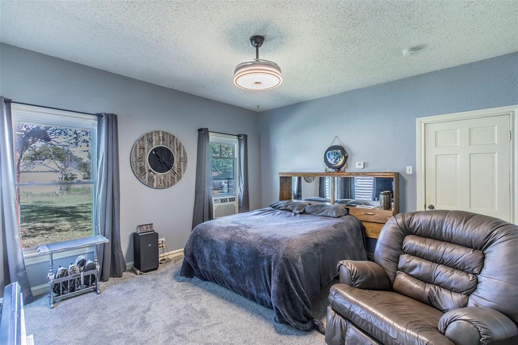 2603 Pine Avenue Waco, TX 76708 - Photo 11 of 23 a bedroom with furniture and a window