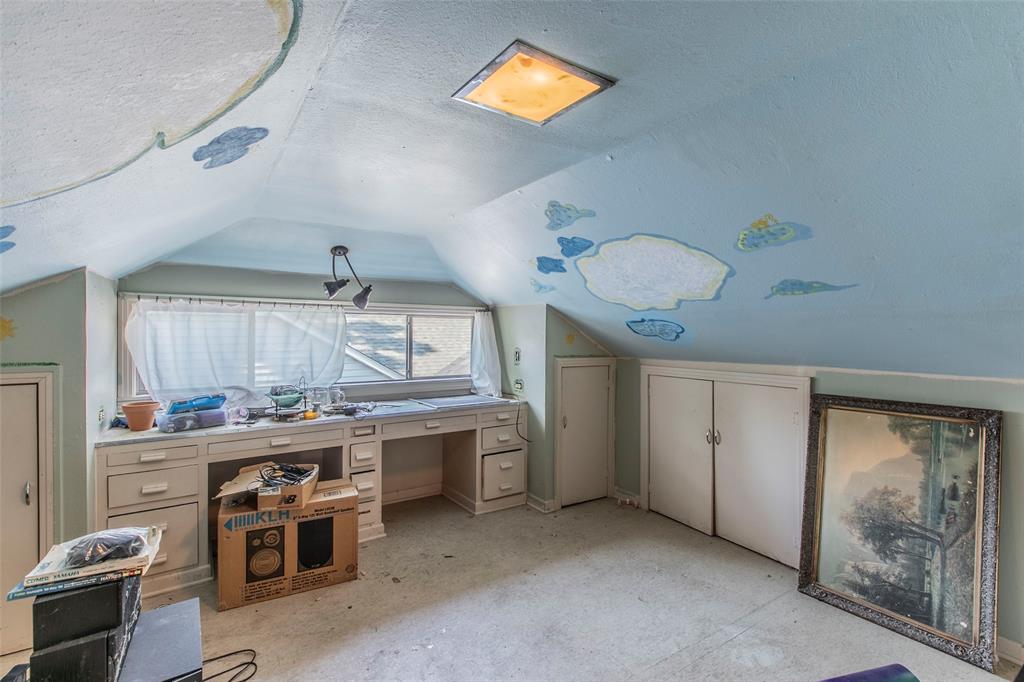 2603 Pine Avenue Waco, TX 76708 - Photo 17 of 23 a kitchen with a stove a refrigerator and a table