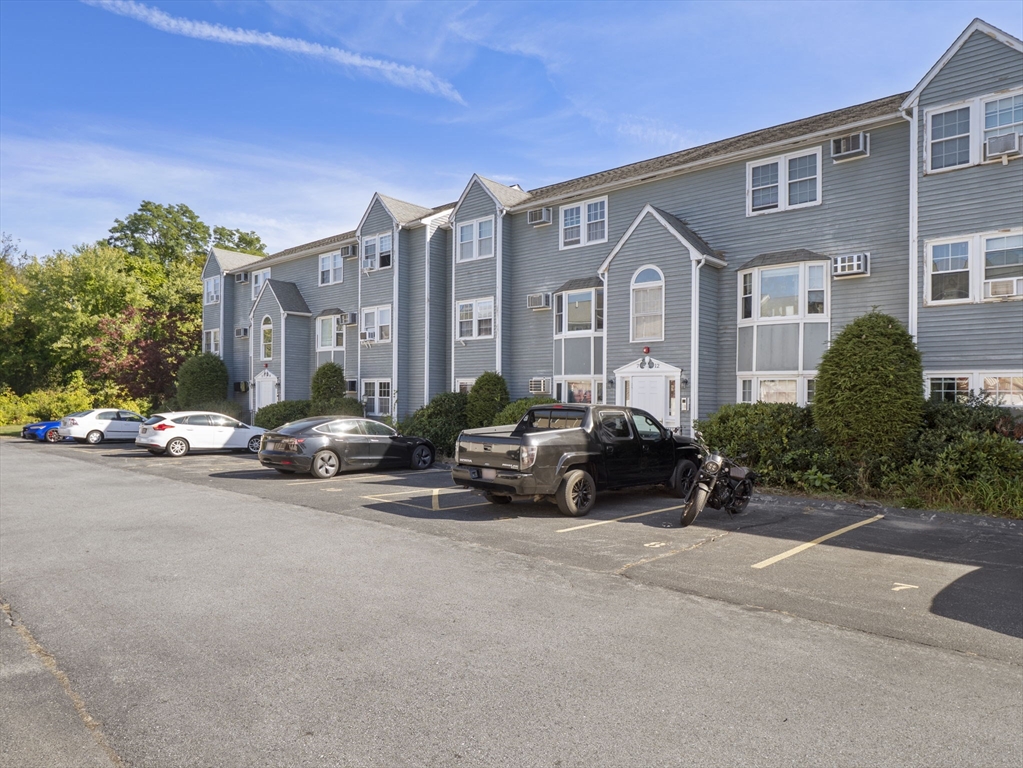 1821 Middlesex Street, Unit 10 Lowell, MA 01851 - Photo 15 of 26 a view of a street in front of a building