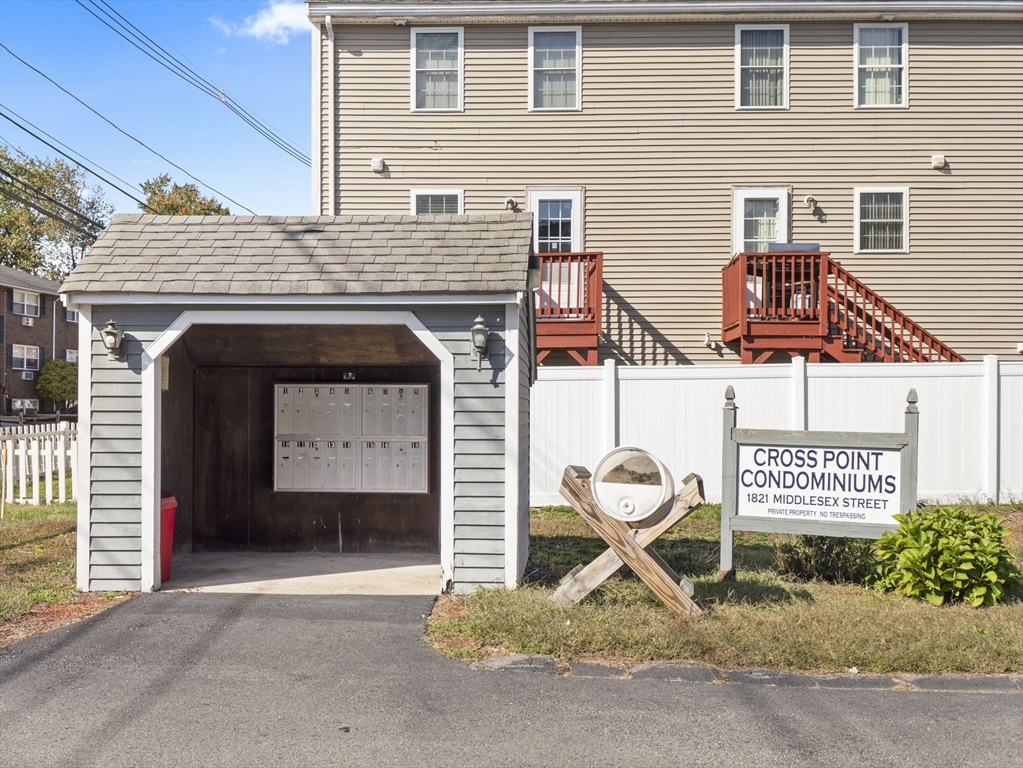 1821 Middlesex Street, Unit 10 Lowell, MA 01851 - Photo 17 of 26 a sign on the side of a building