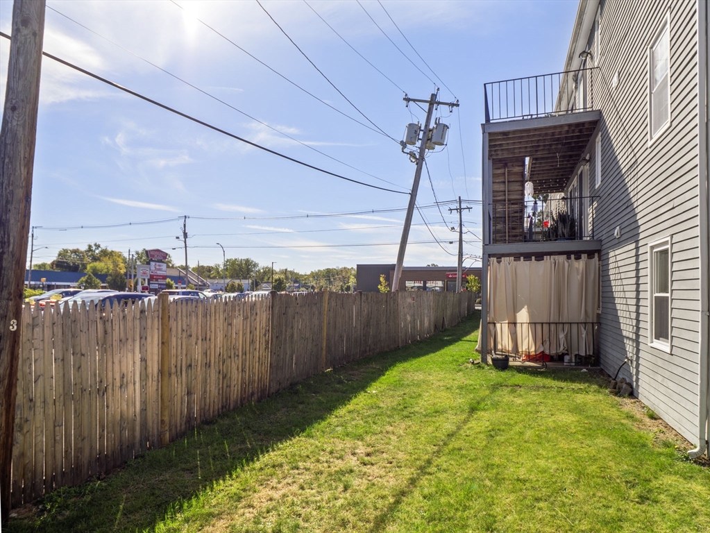 1821 Middlesex Street, Unit 10 Lowell, MA 01851 - Photo 24 of 26 a view of a backyard with sitting area