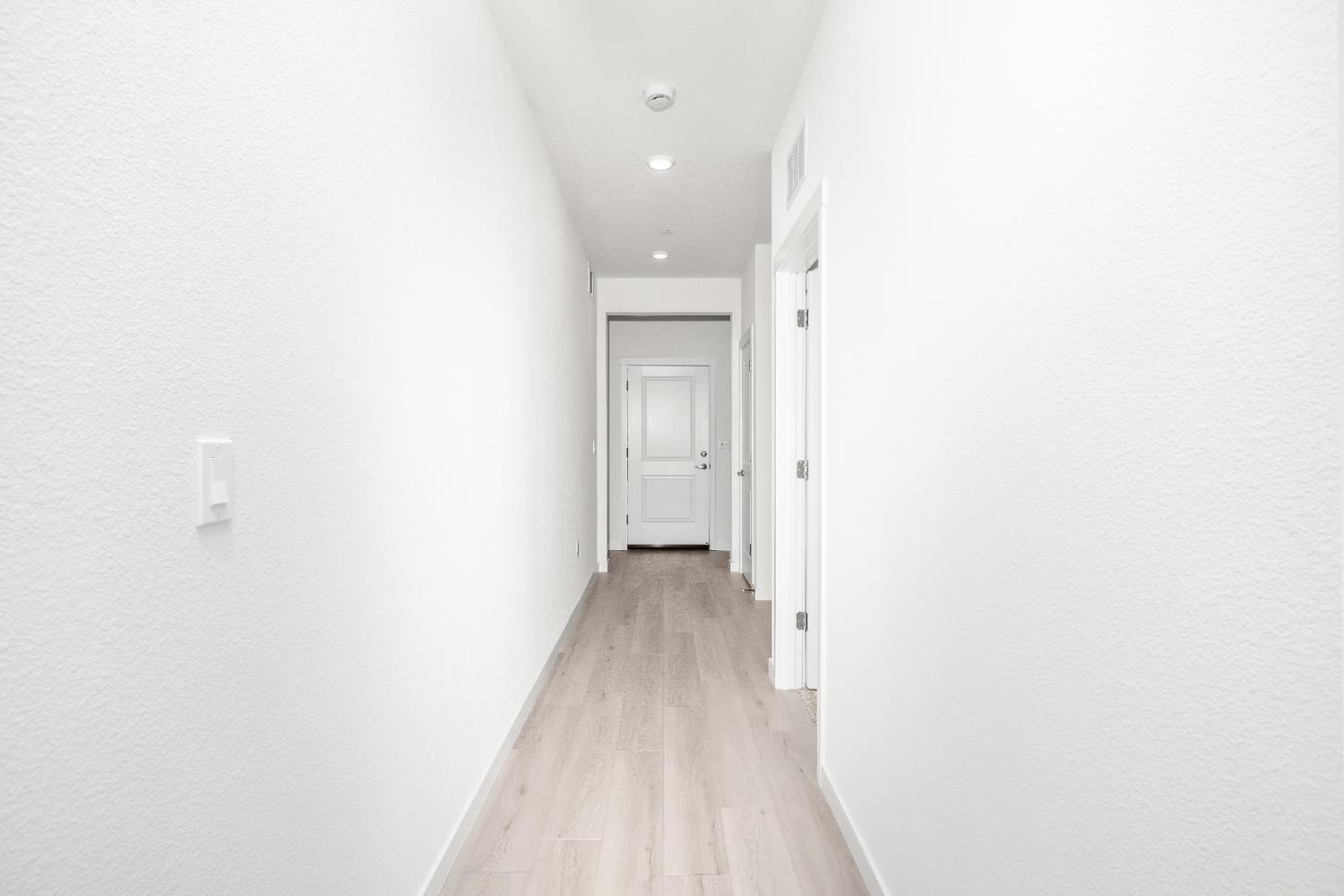 929 South Mylea Court Stockton, CA 95215 - Photo 5 of 8 a view of a room with wooden floor