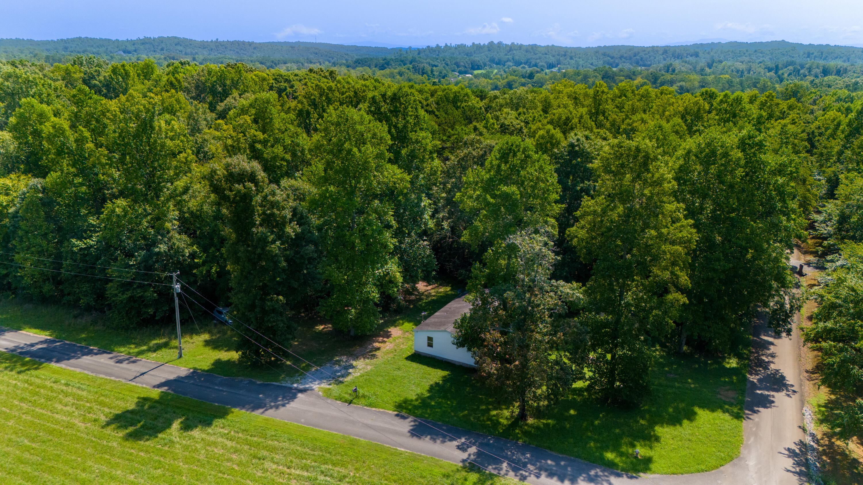 250 Kirkpatrick Road McDonald, TN 37353 - Photo 13 of 28 DJI_20240805114154_0067_777
