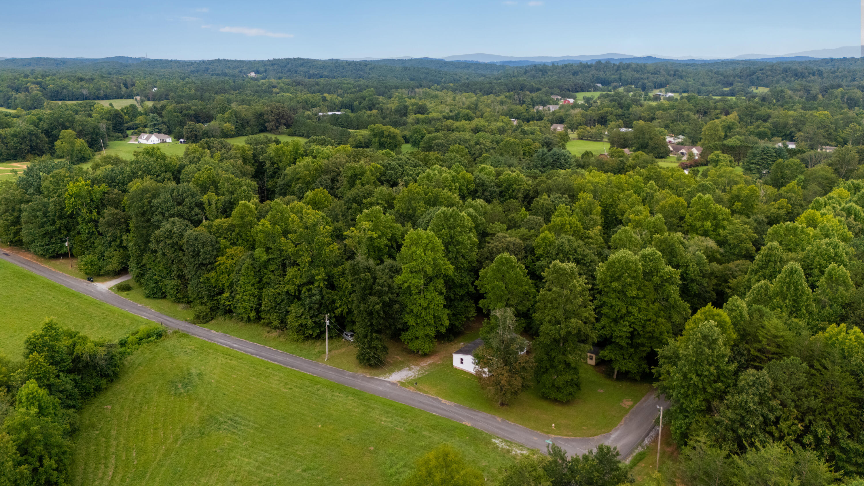 250 Kirkpatrick Road McDonald, TN 37353 - Photo 23 of 28 DJI_20240811182904_0323_777