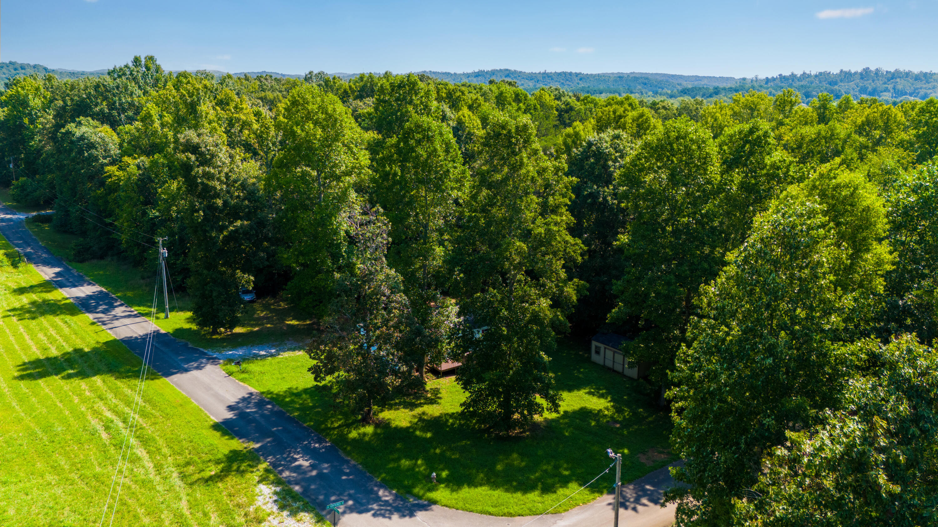 250 Kirkpatrick Road McDonald, TN 37353 - Photo 3 of 28 DJI_20240805111437_0975_777