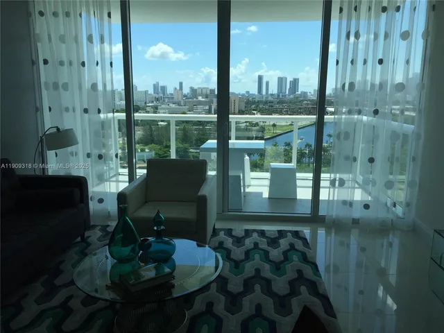 a view of a balcony with chair and table
