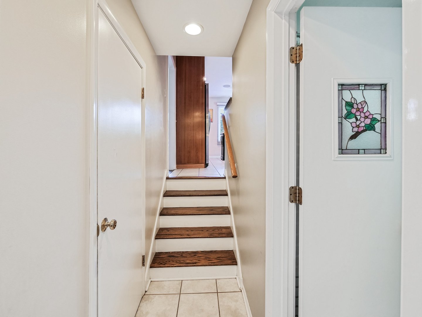 1903 Hopi Lane Mount Prospect, IL 60056 - Photo 11 of 36 a view of a hallway with paintings on the wall