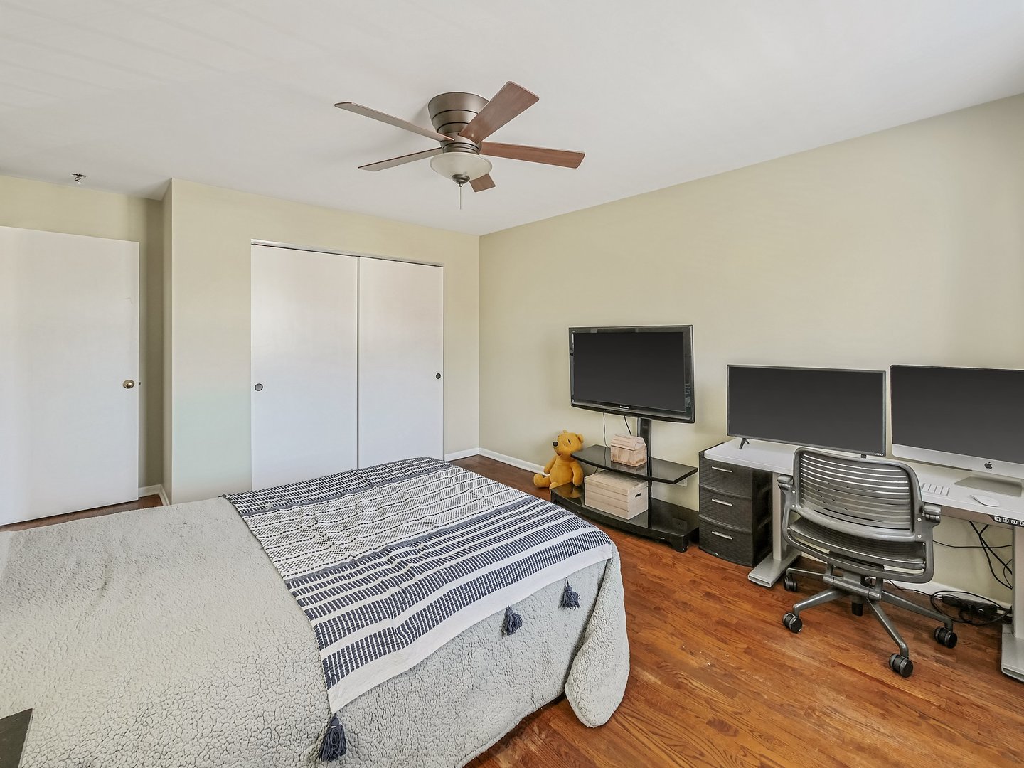 1903 Hopi Lane Mount Prospect, IL 60056 - Photo 13 of 36 a bedroom with a bed and a flat screen tv