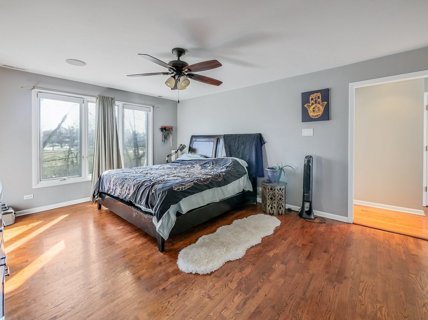 1903 Hopi Lane Mount Prospect, IL 60056 - Photo 18 of 36 a bedroom with a bed dresser and a window