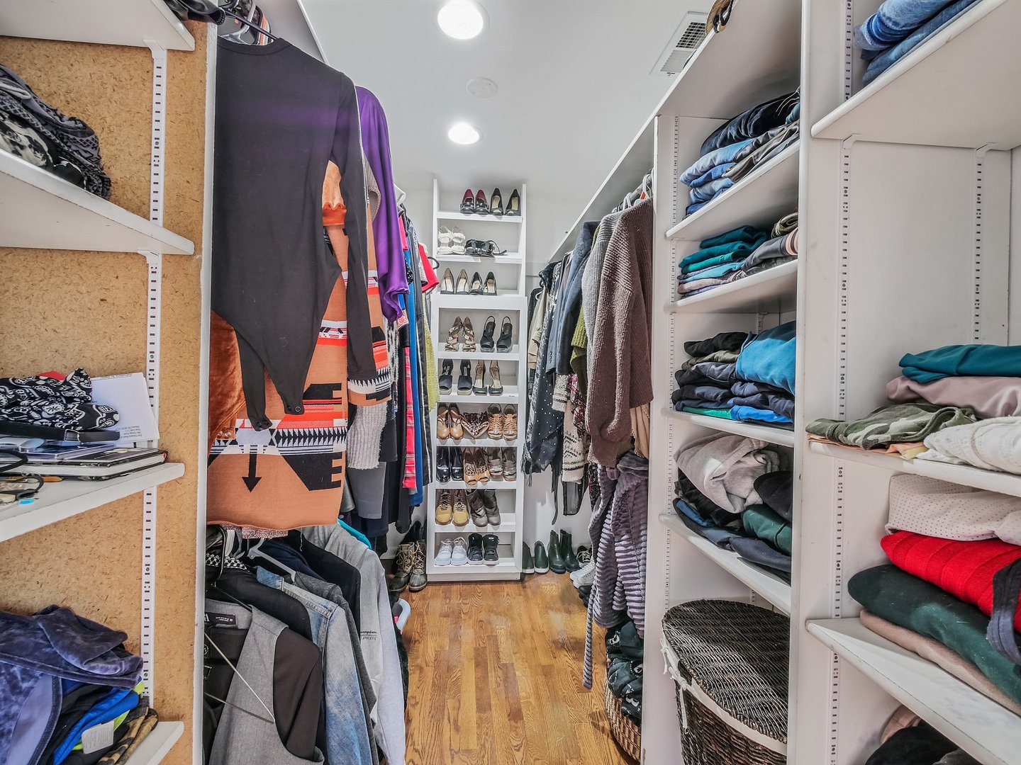 1903 Hopi Lane Mount Prospect, IL 60056 - Photo 23 of 36 a view of walk in closet with clothes and shoes