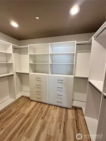 a view of an empty walk in closet