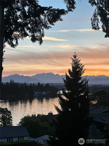 a view of lake with mountain