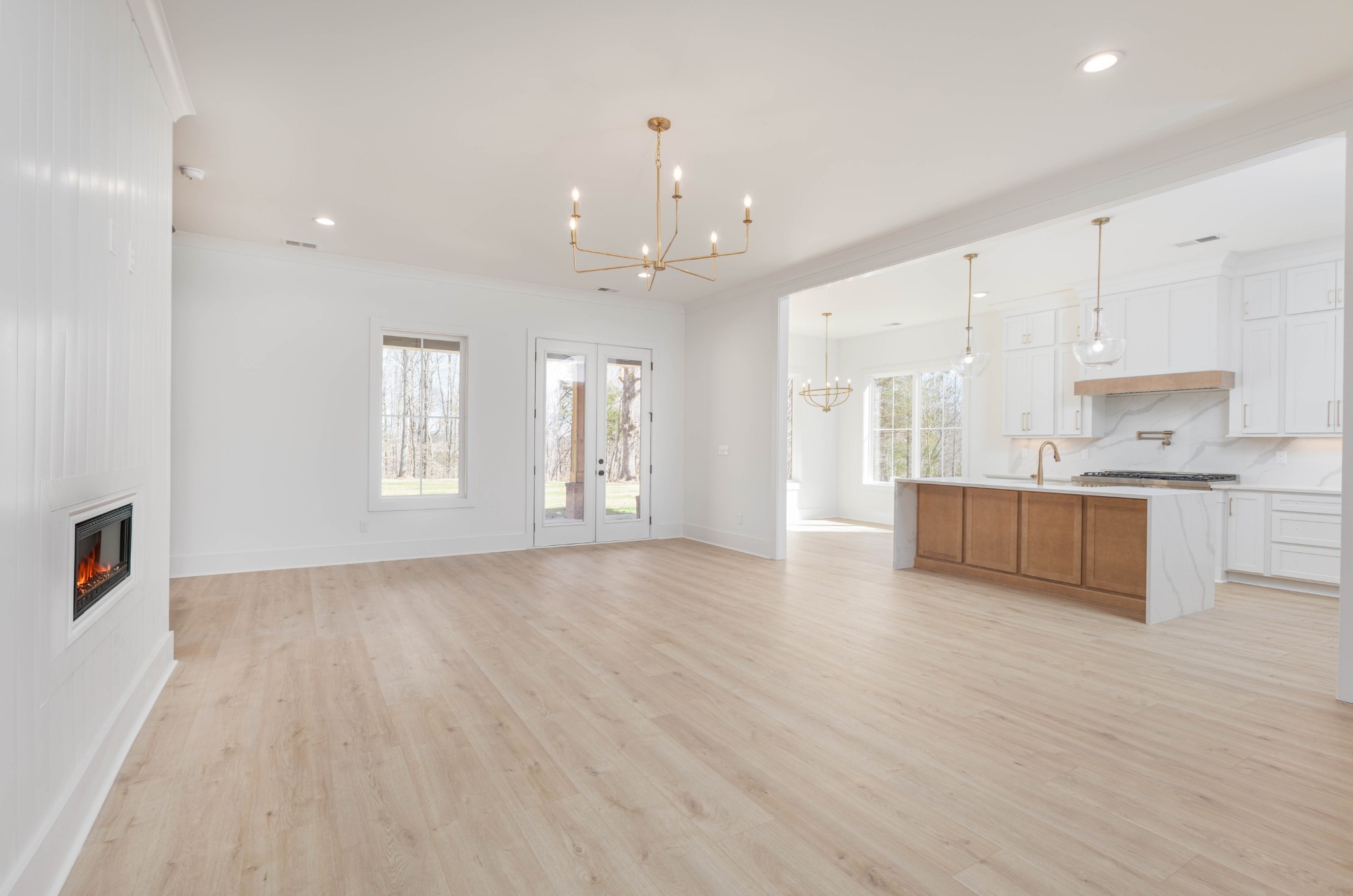 7771 Barnhill Road Primm Springs, TN 38476 - Photo 13 of 61 a view of an empty room with kitchen and window