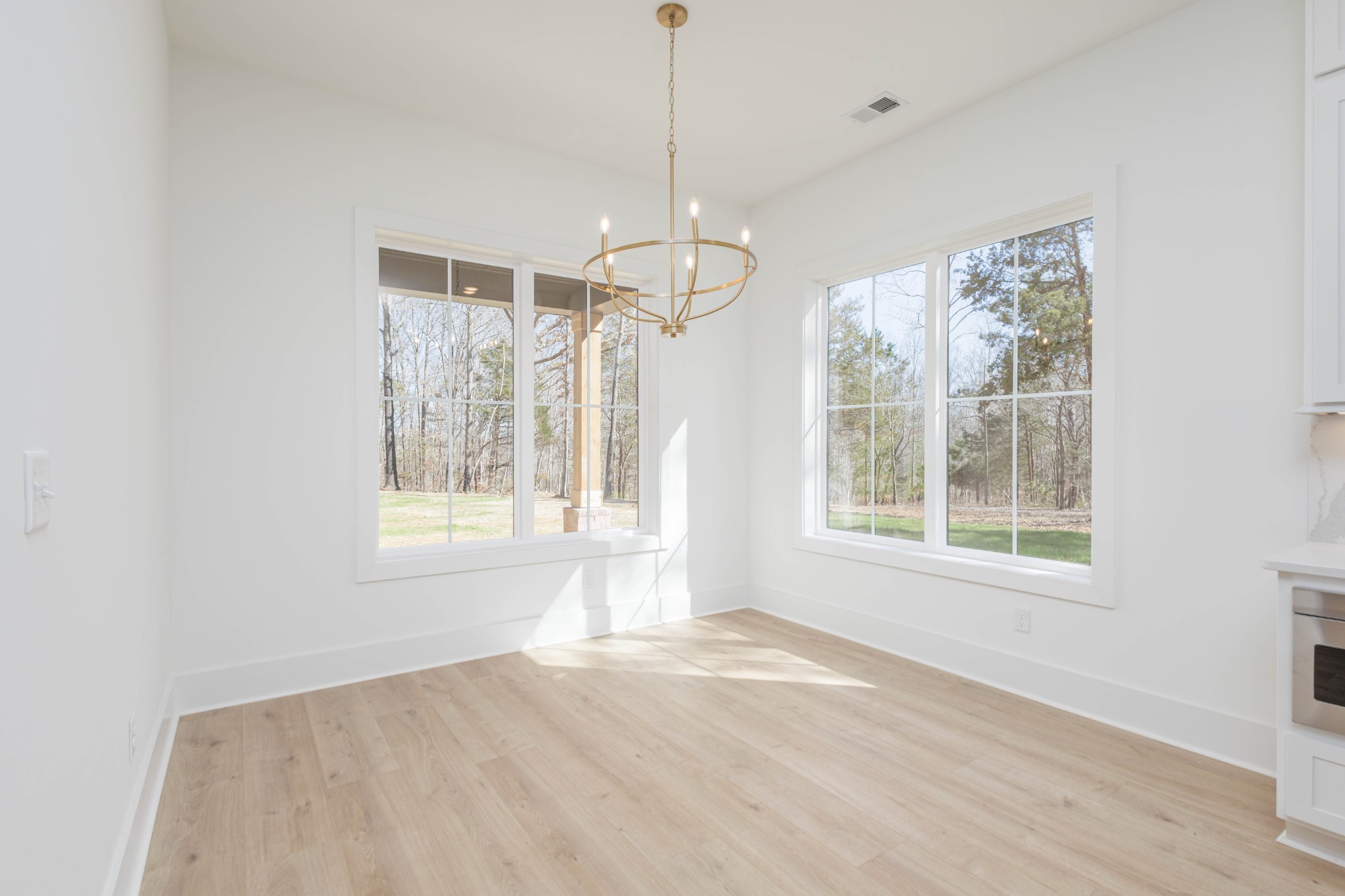 7771 Barnhill Road Primm Springs, TN 38476 - Photo 15 of 61 a view of an empty room with a window