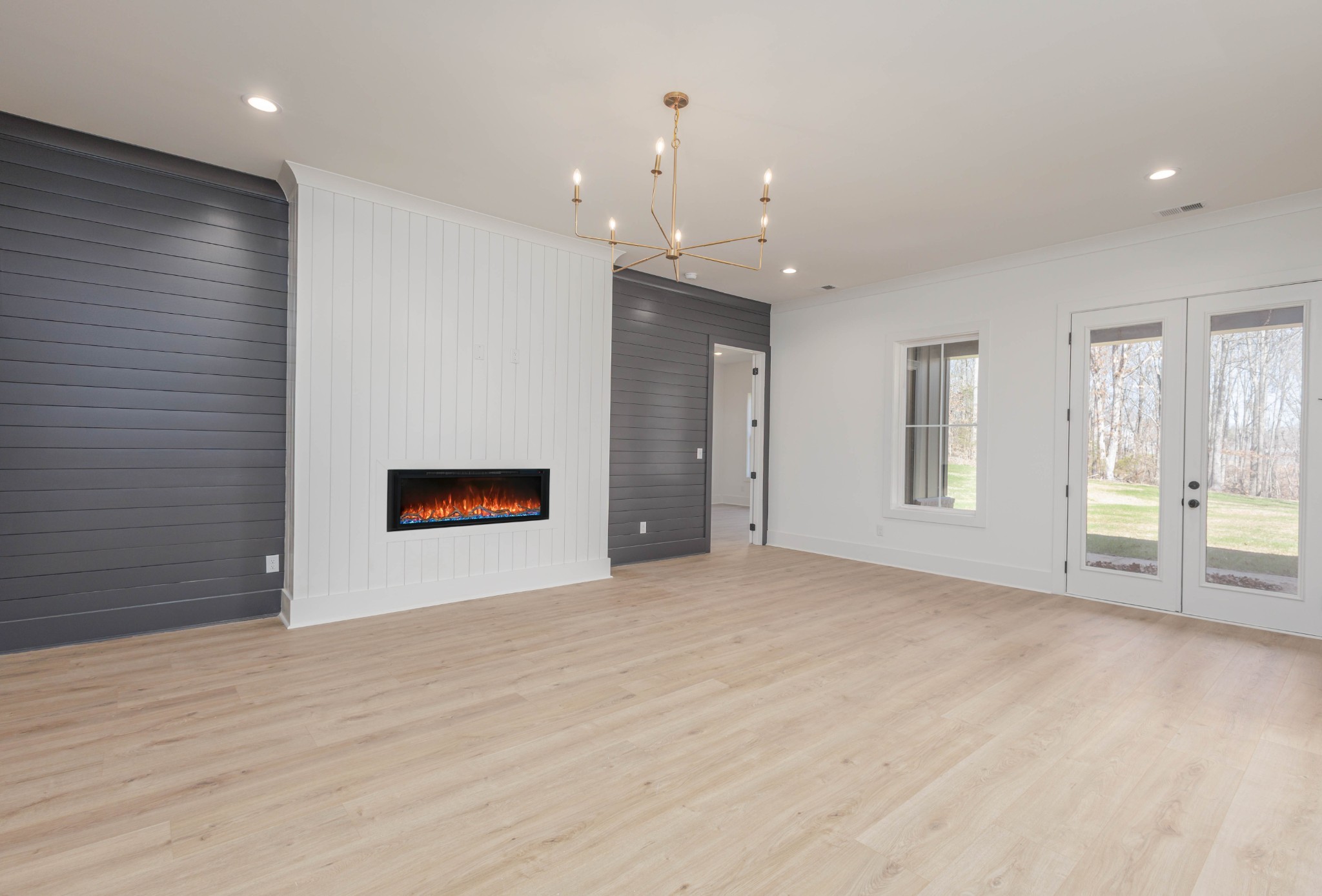 7771 Barnhill Road Primm Springs, TN 38476 - Photo 24 of 61 an empty room with closet and windows