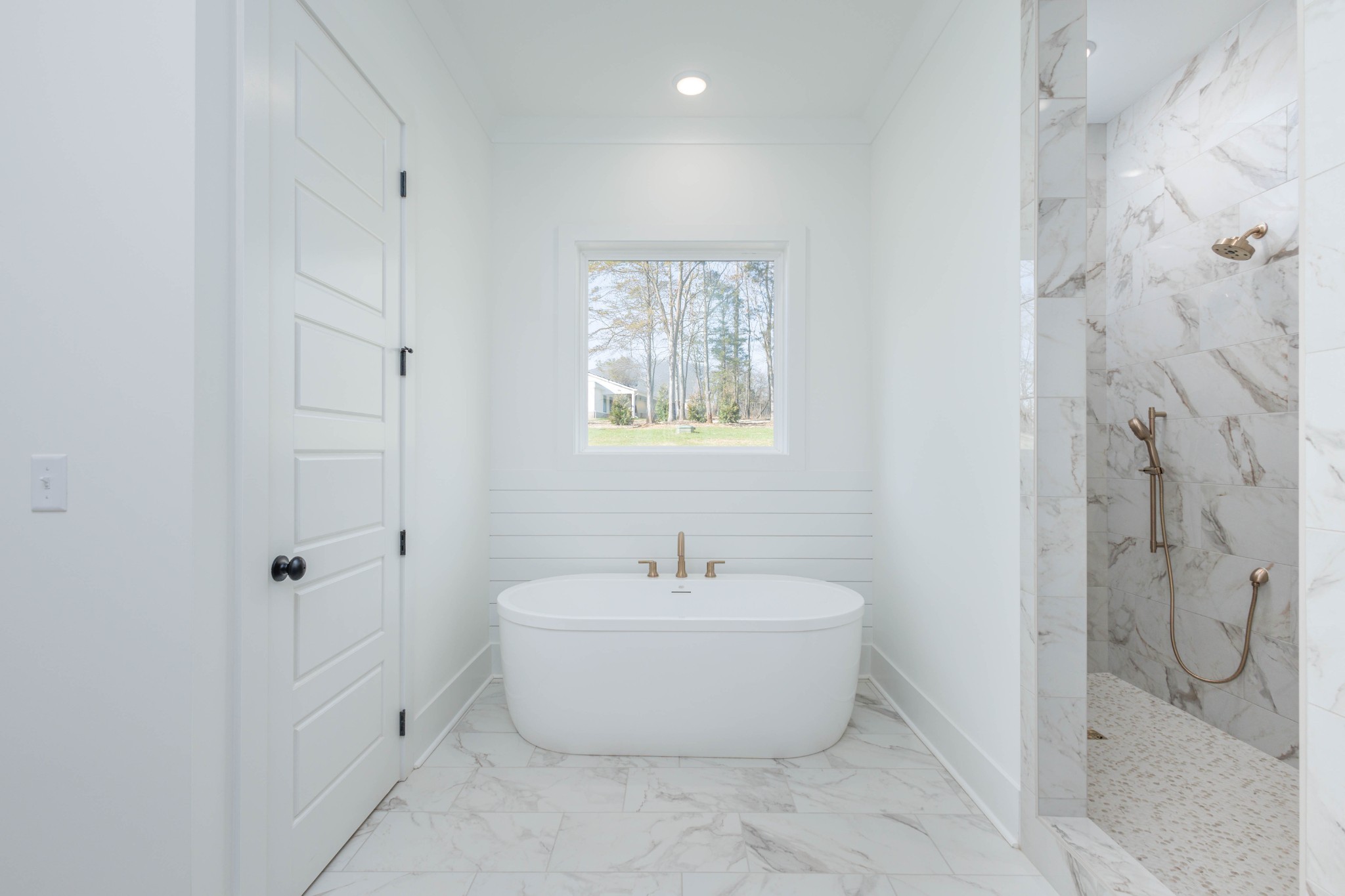 7771 Barnhill Road Primm Springs, TN 38476 - Photo 34 of 61 a white room with shower