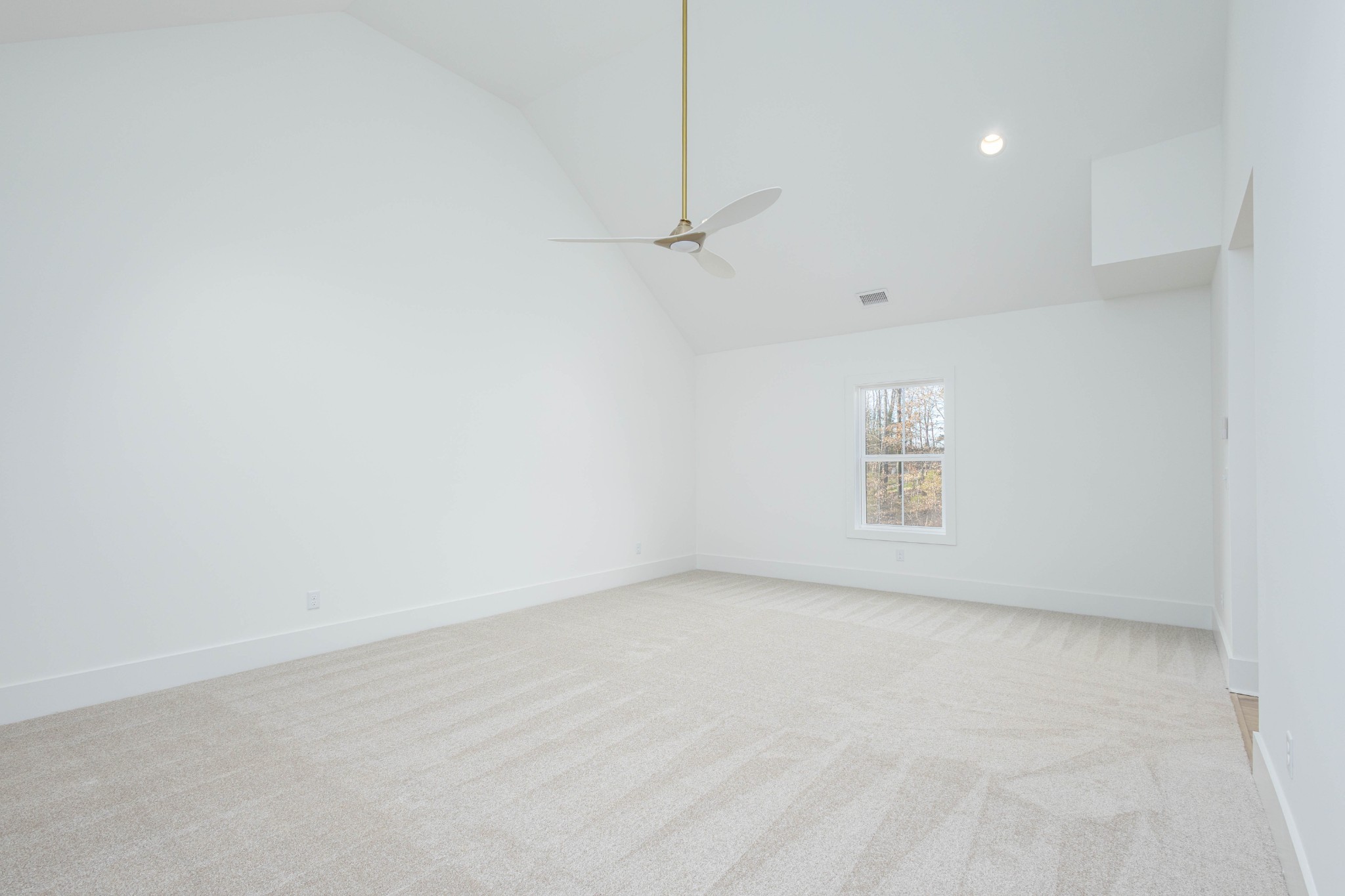 7771 Barnhill Road Primm Springs, TN 38476 - Photo 45 of 61 an empty room with a empty space and a window