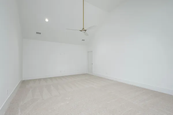 a bathroom with a bathtub and a toilet