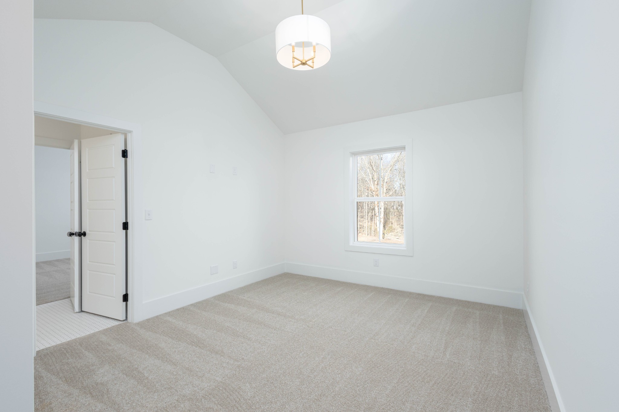 7771 Barnhill Road Primm Springs, TN 38476 - Photo 53 of 61 an empty room with a window