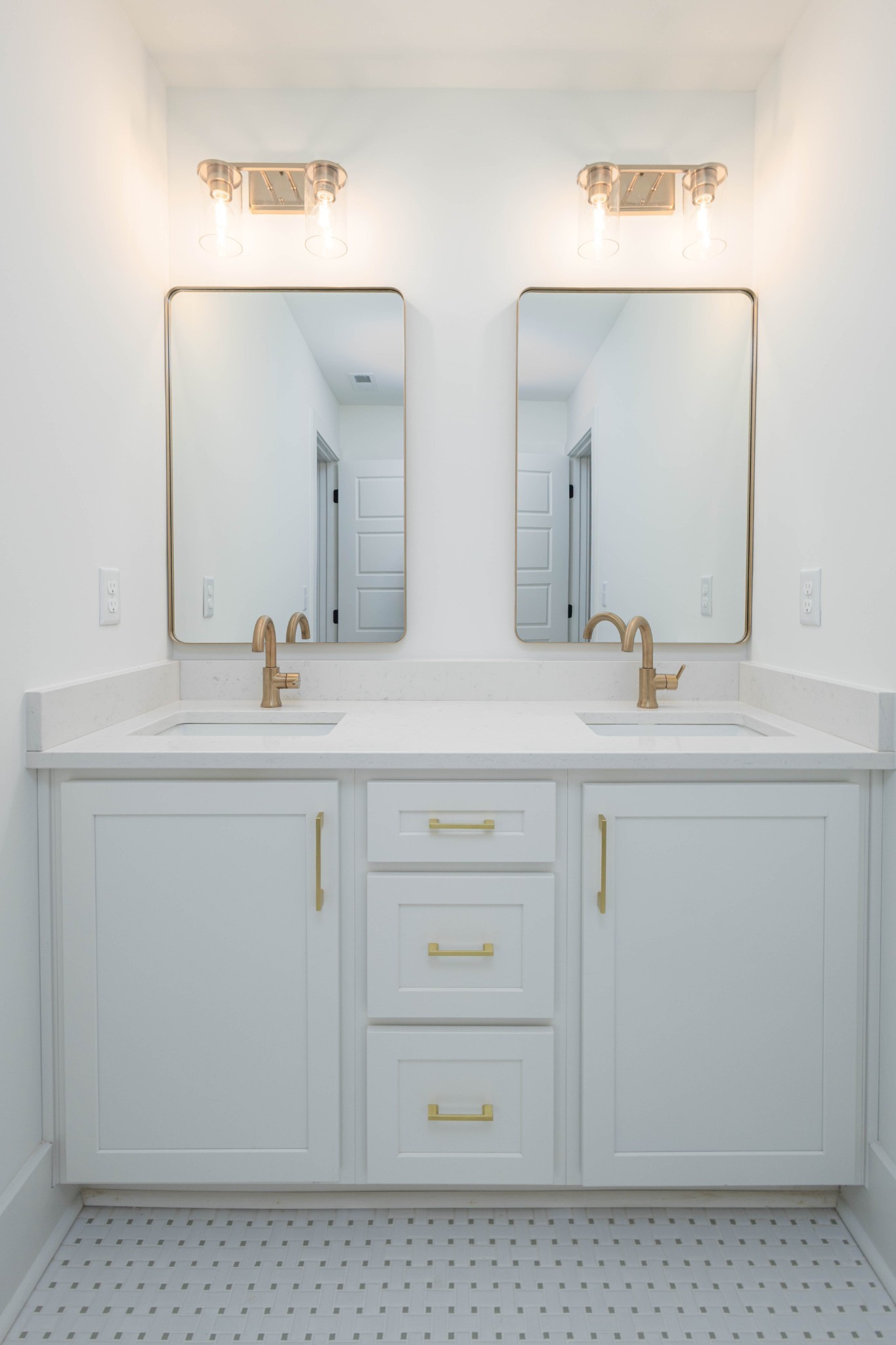7771 Barnhill Road Primm Springs, TN 38476 - Photo 54 of 61 a bathroom with a double vanity sink and mirror
