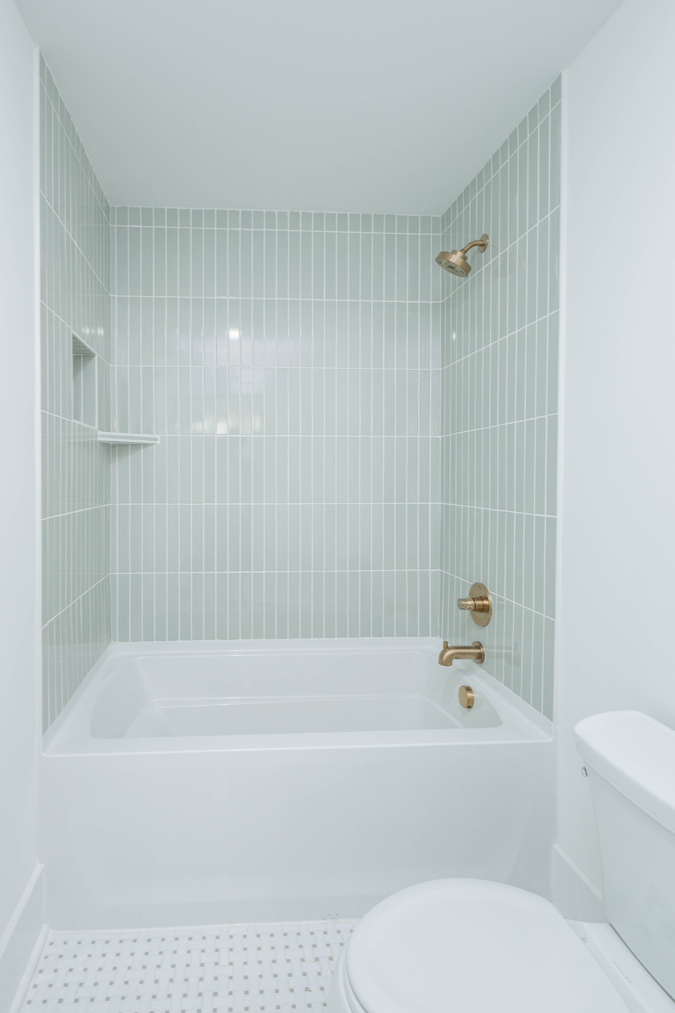 7771 Barnhill Road Primm Springs, TN 38476 - Photo 55 of 61 a bathroom with a bathtub and a toilet