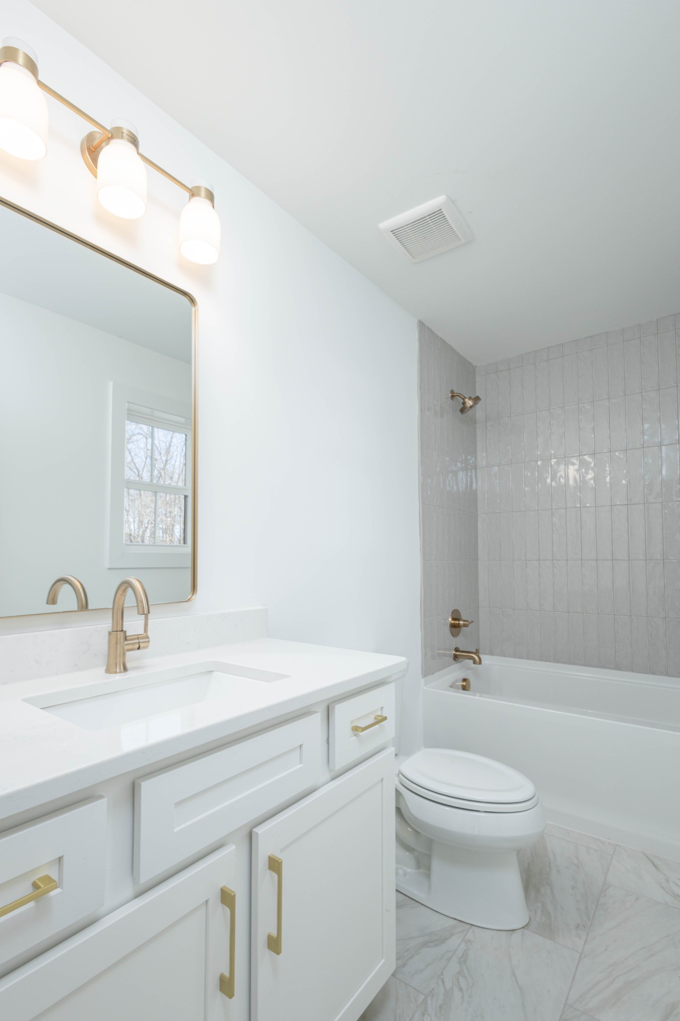 7771 Barnhill Road Primm Springs, TN 38476 - Photo 60 of 61 a bathroom with a sink a toilet and a large mirror