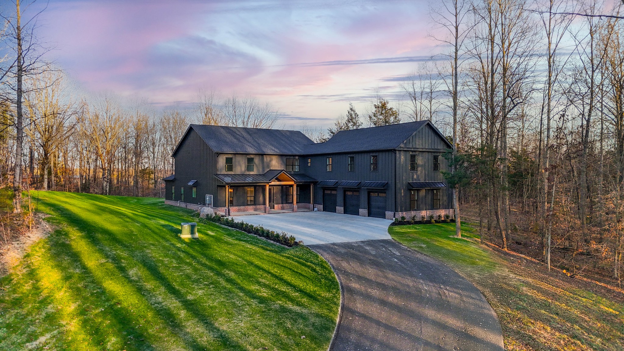 7771 Barnhill Road Primm Springs, TN 38476 - Photo 6 of 61 a view of a big house with a big yard plants and large trees