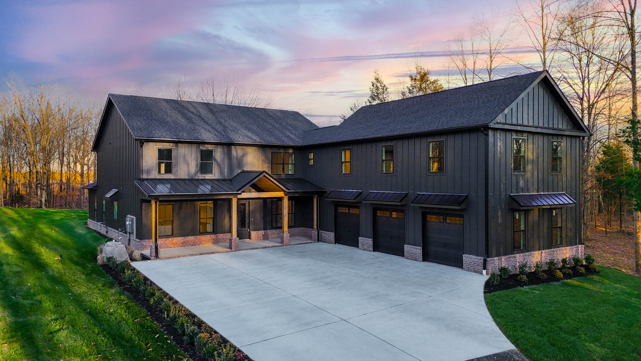 7771 Barnhill Road Primm Springs, TN 38476 - Photo 7 of 61 a front view of a house with a yard