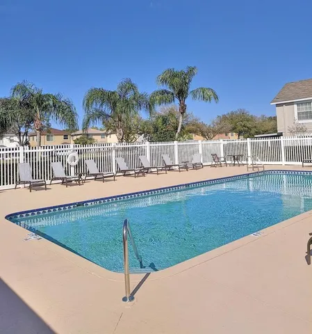 a view of a house with a swimming pool