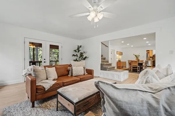 a view of a dining room with furniture window and outside view