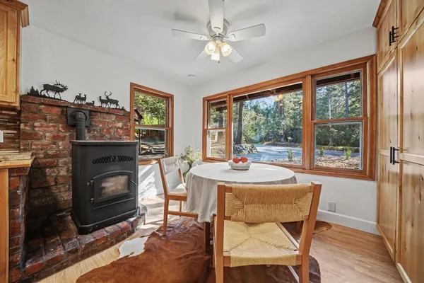 a bedroom with bed and a chandelier
