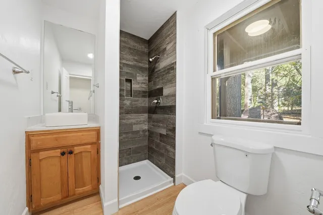 a bathroom with a sink and a window