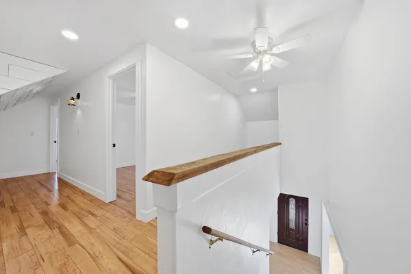 a view of a chair and table in backyard