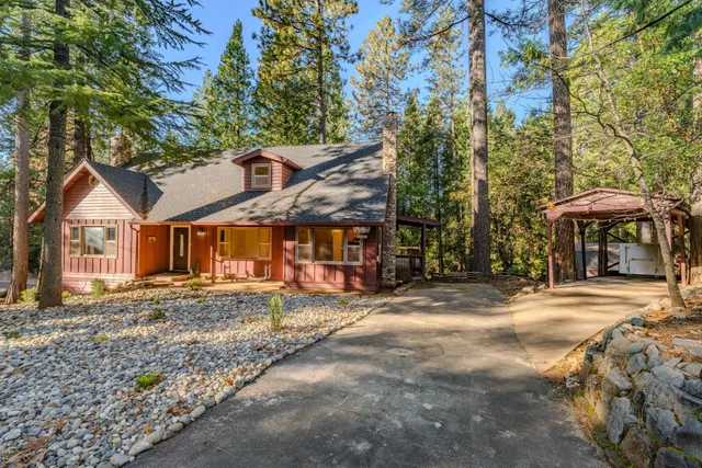 a view of balcony with wooden floor and fence