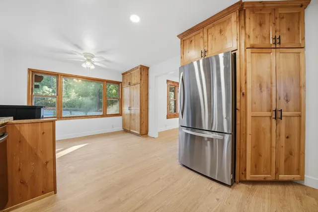 a view of entryway with wooden floor