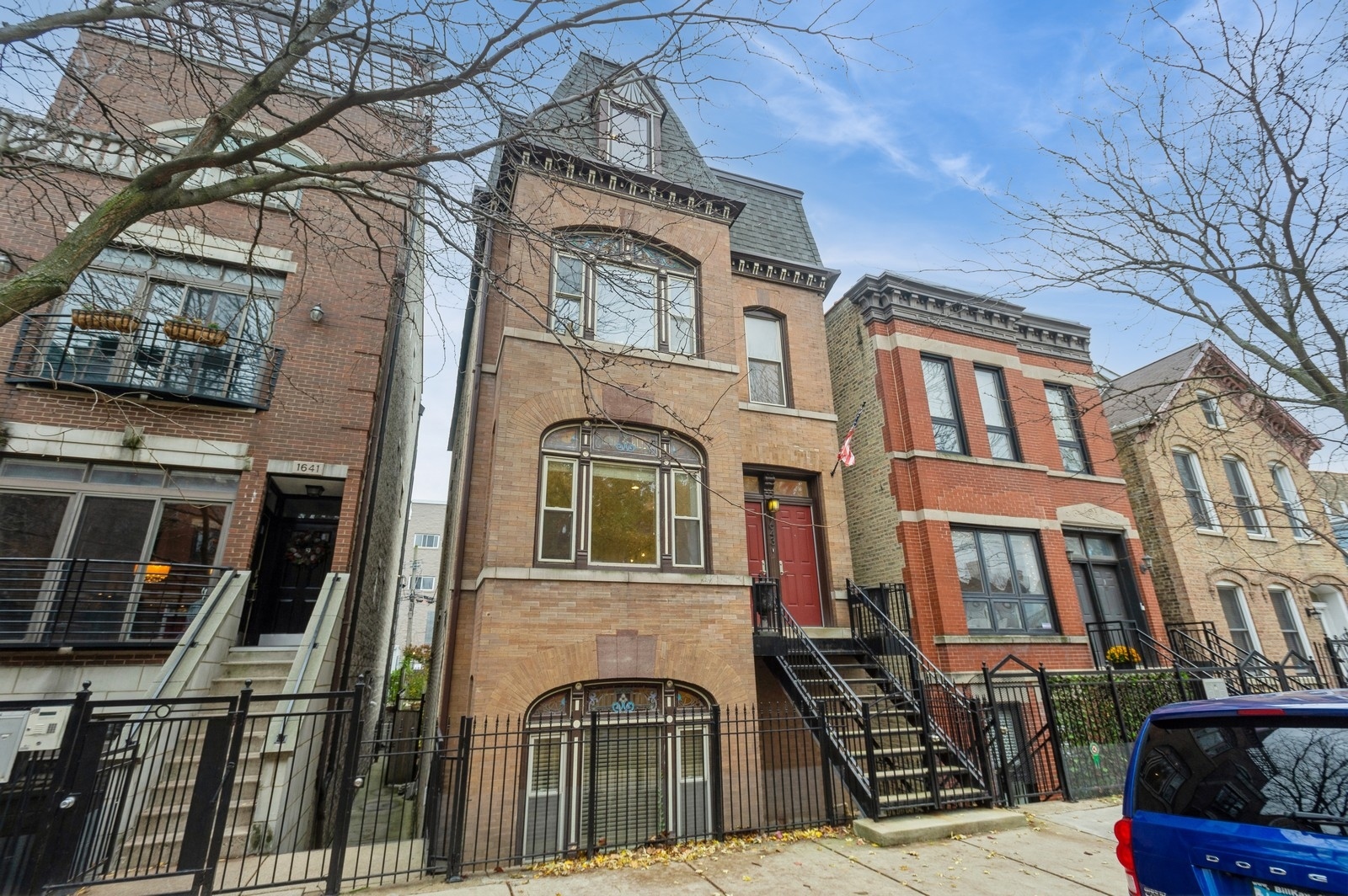 1643 West Julian Street Chicago, IL 60622 - Photo 1 of 20 a view of a building with many windows