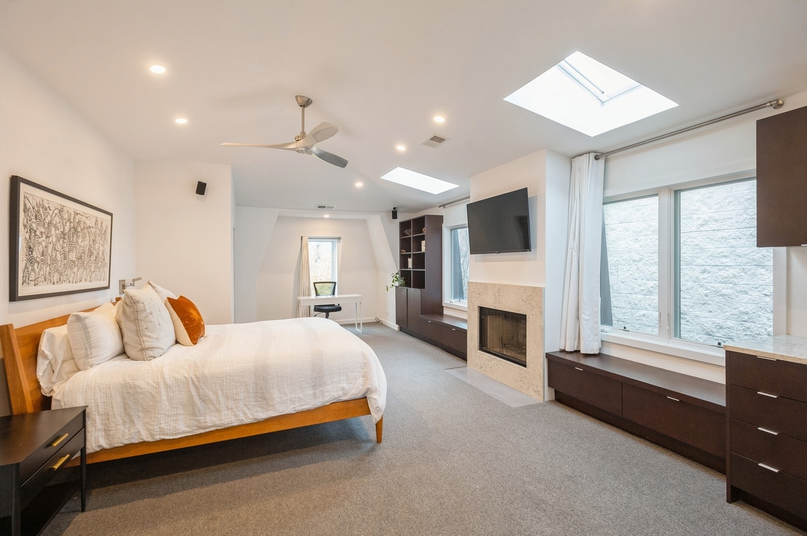 1643 West Julian Street Chicago, IL 60622 - Photo 12 of 20 a bed room with a bed and a fireplace