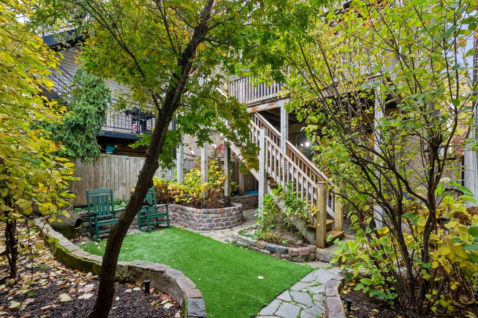 1643 West Julian Street Chicago, IL 60622 - Photo 20 of 20 a view of a house with a tree in a yard