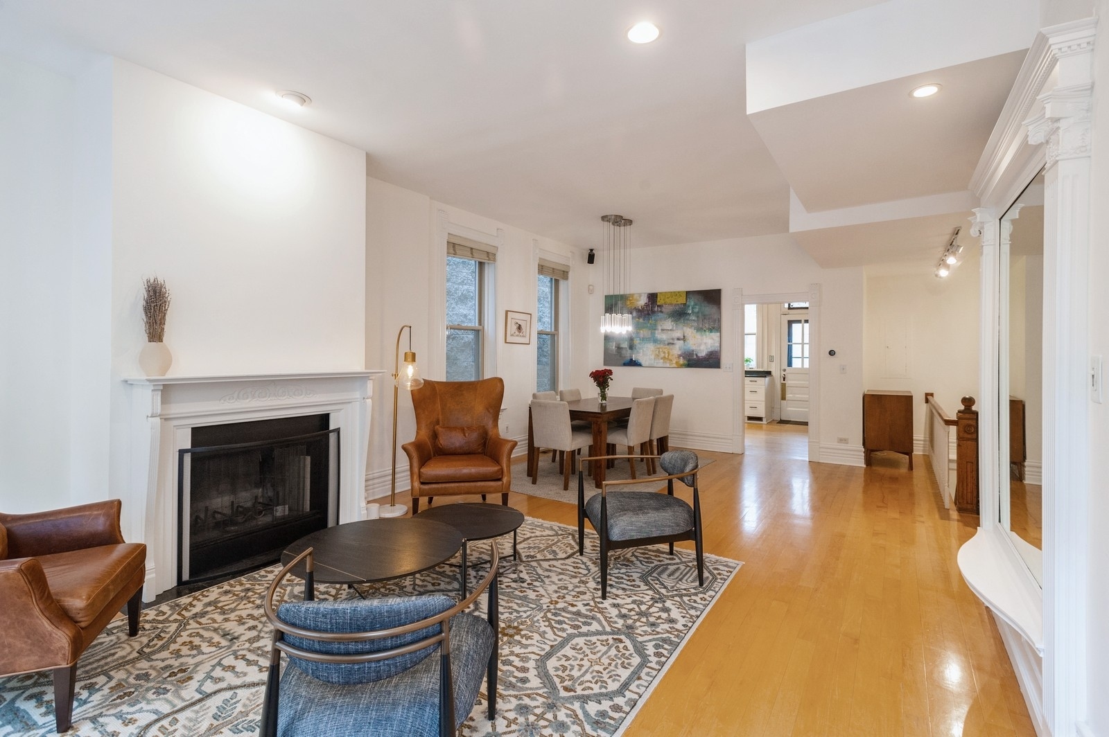 1643 West Julian Street Chicago, IL 60622 - Photo 2 of 20 a living room with furniture a fireplace and a table