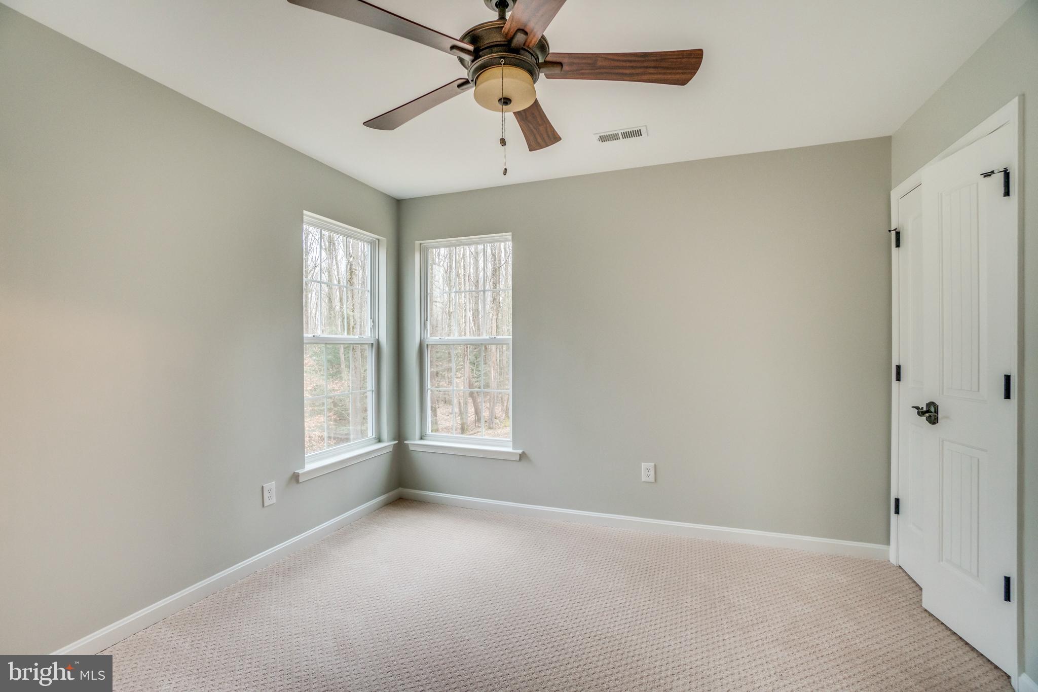 15260 Brickhouse Road King George, VA 22485 - Photo 50 of 57 Bedroom 2 with fans, new doors and hardware
