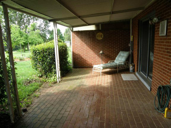 2239 Ranch Road Northwest Roanoke, VA 24017 - Photo 15 of 15 a view of a porch with wooden floor